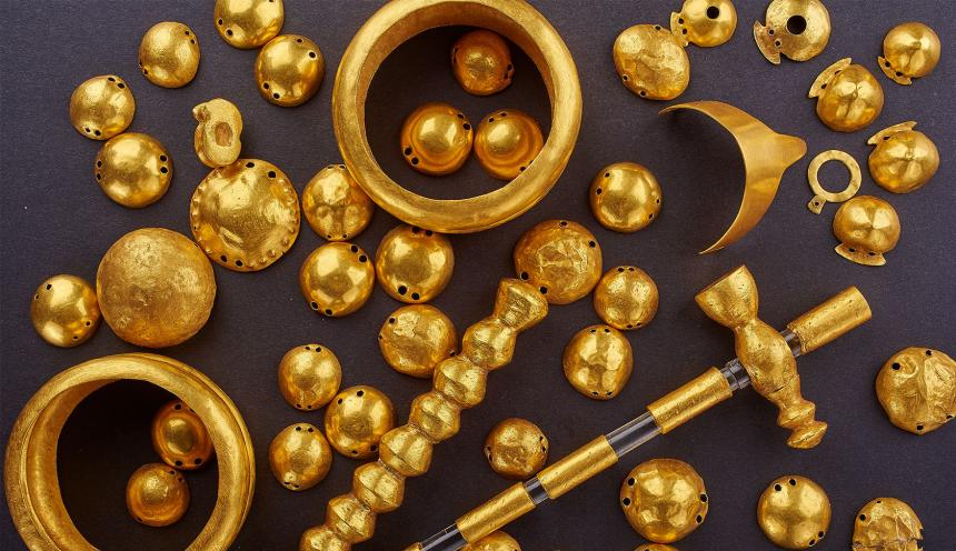 These gold objects include bracelets, dress appliqués, a miniature diadem, pendants and a scepter. They were found in Varna, Bulgaria, and indicate hierarchy and status. They date to the late Copper Age, 4600-4400 B.C. The Varna Regional Museum of History in Bulgaria contributed the artifacts. (Photo by Ádám Vágó)