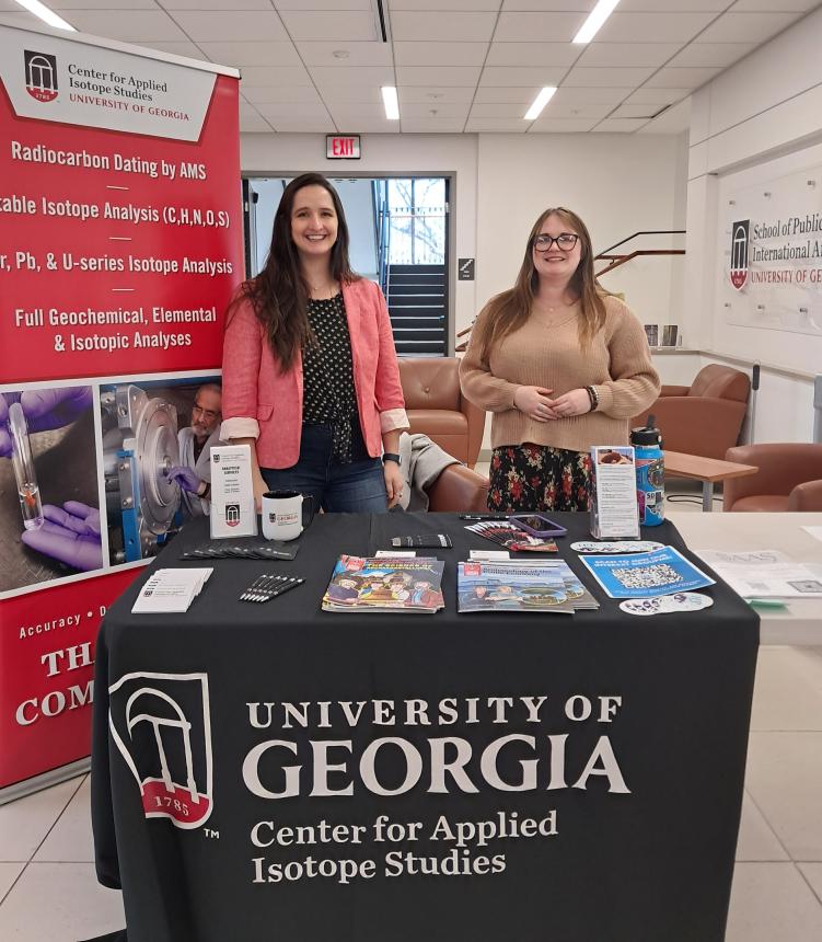 Drs. Katherine Reinberger and Megan Conger gave away comic books that illustrated examples of isotopic studies for the public.