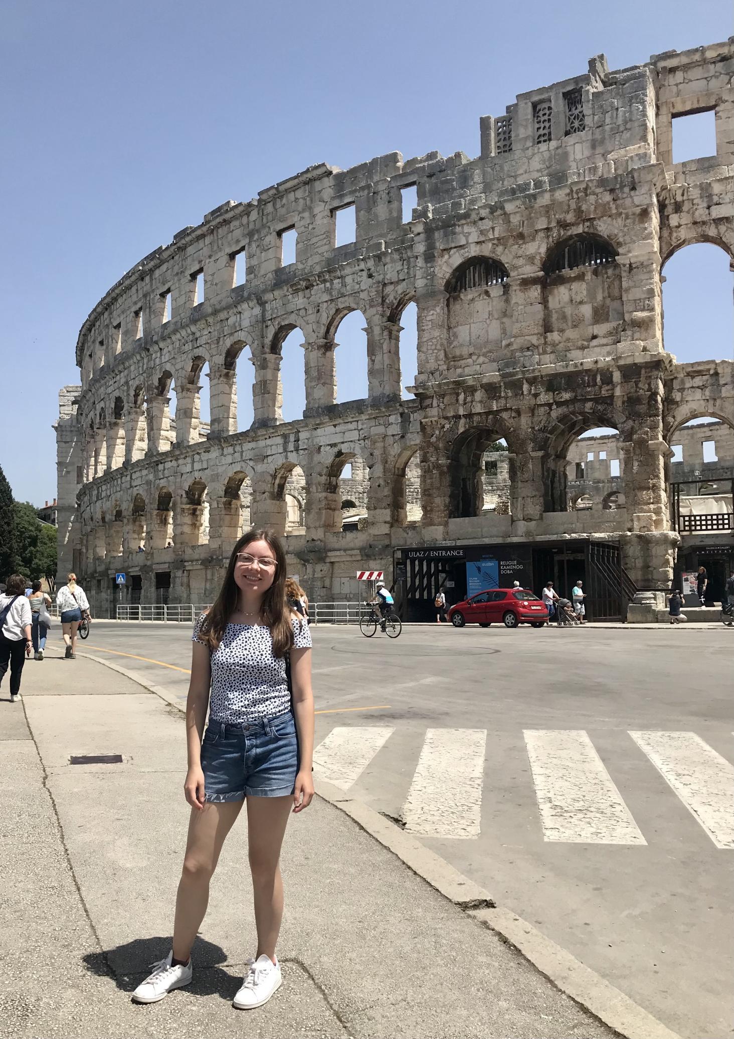 "This summer I went to Croatia for the Heritage Conservation & Archaeology study abroad! Here's a picture of me outside the Pula Arena, one of the largest and most well-preserved Roman amphitheaters in the world." -Sophie Forbes