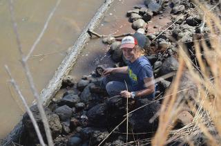 Lindsey Cochran taking water samples on Sapelo Island, Georgia.