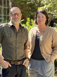 Dr Victor Thompson and Dr Jennifer Birch stand outside