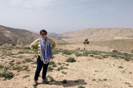 Dr. Pilaar Birch standing at her field site in Jordan