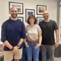 3 people smiling at the camera